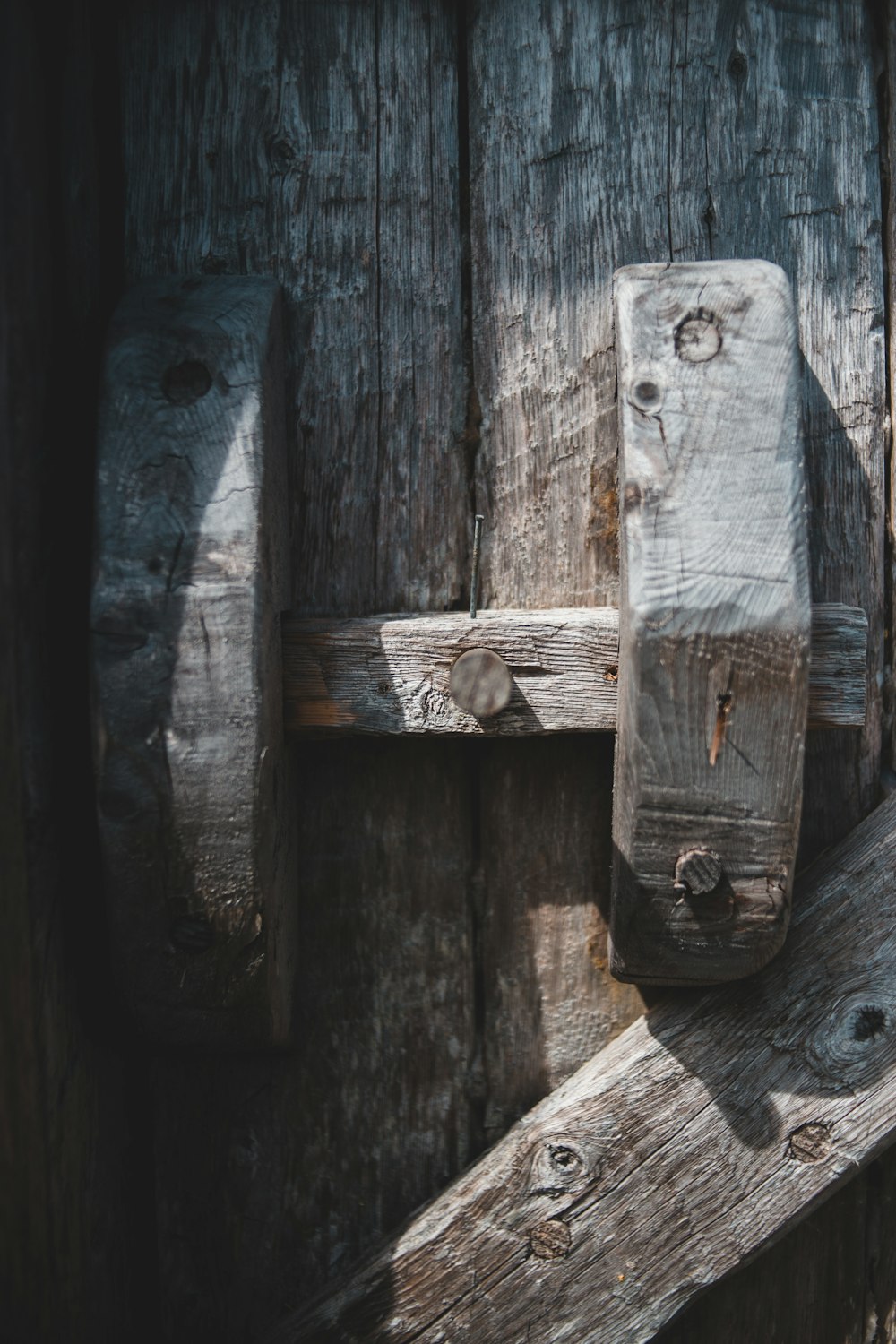 brown wooden fence with hole