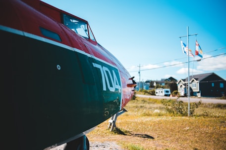Close-up of a phone displaying the number +1(866) 332-08-26 for flight support.
