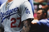man in white and black jersey shirt