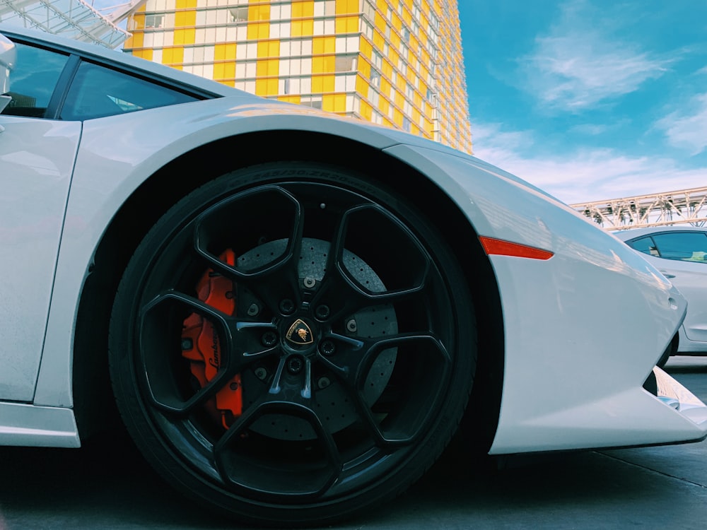 white car with black wheel