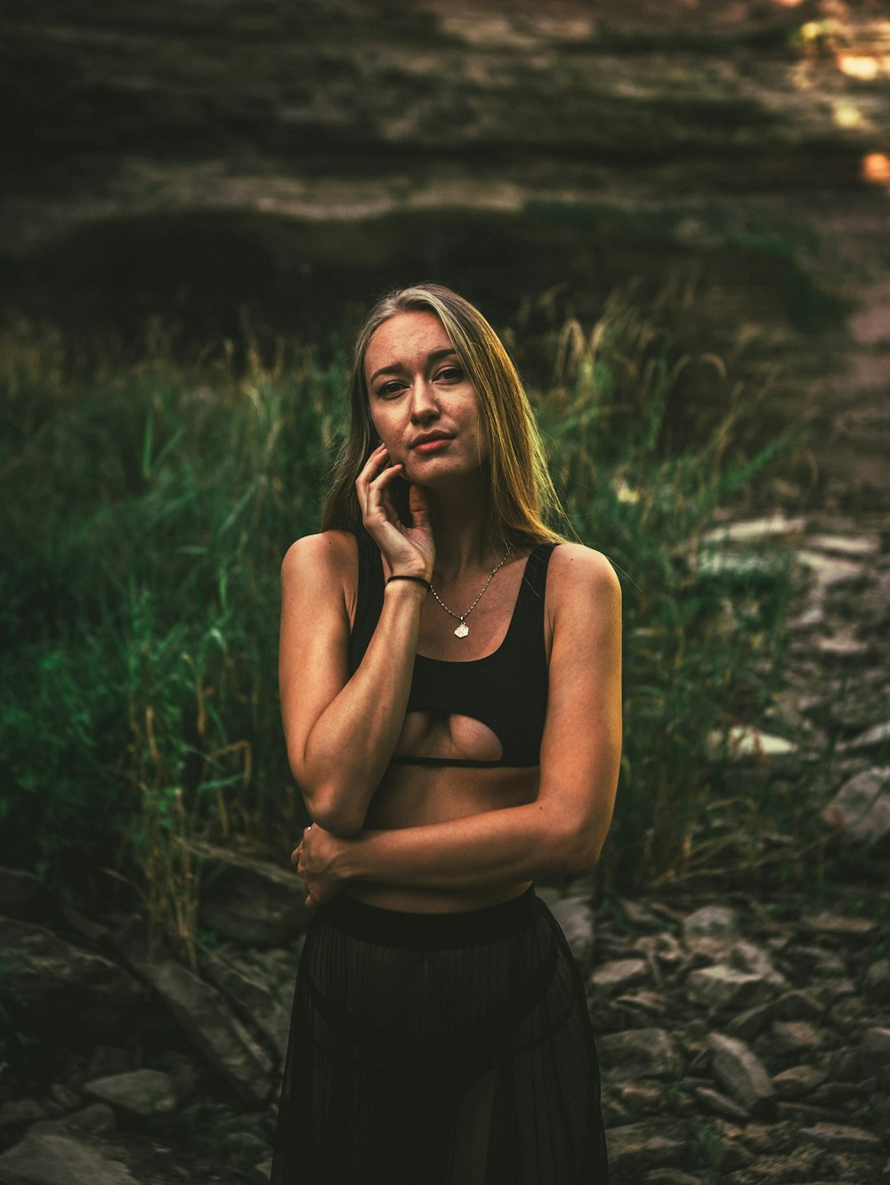 woman in black tank top and black skirt