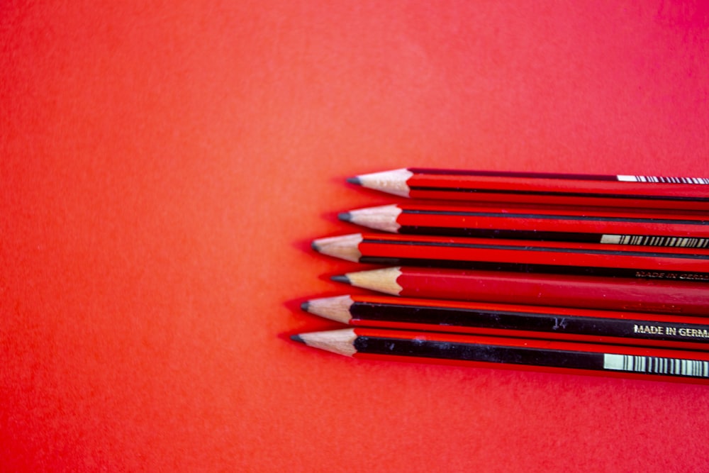 red color pencil on red surface
