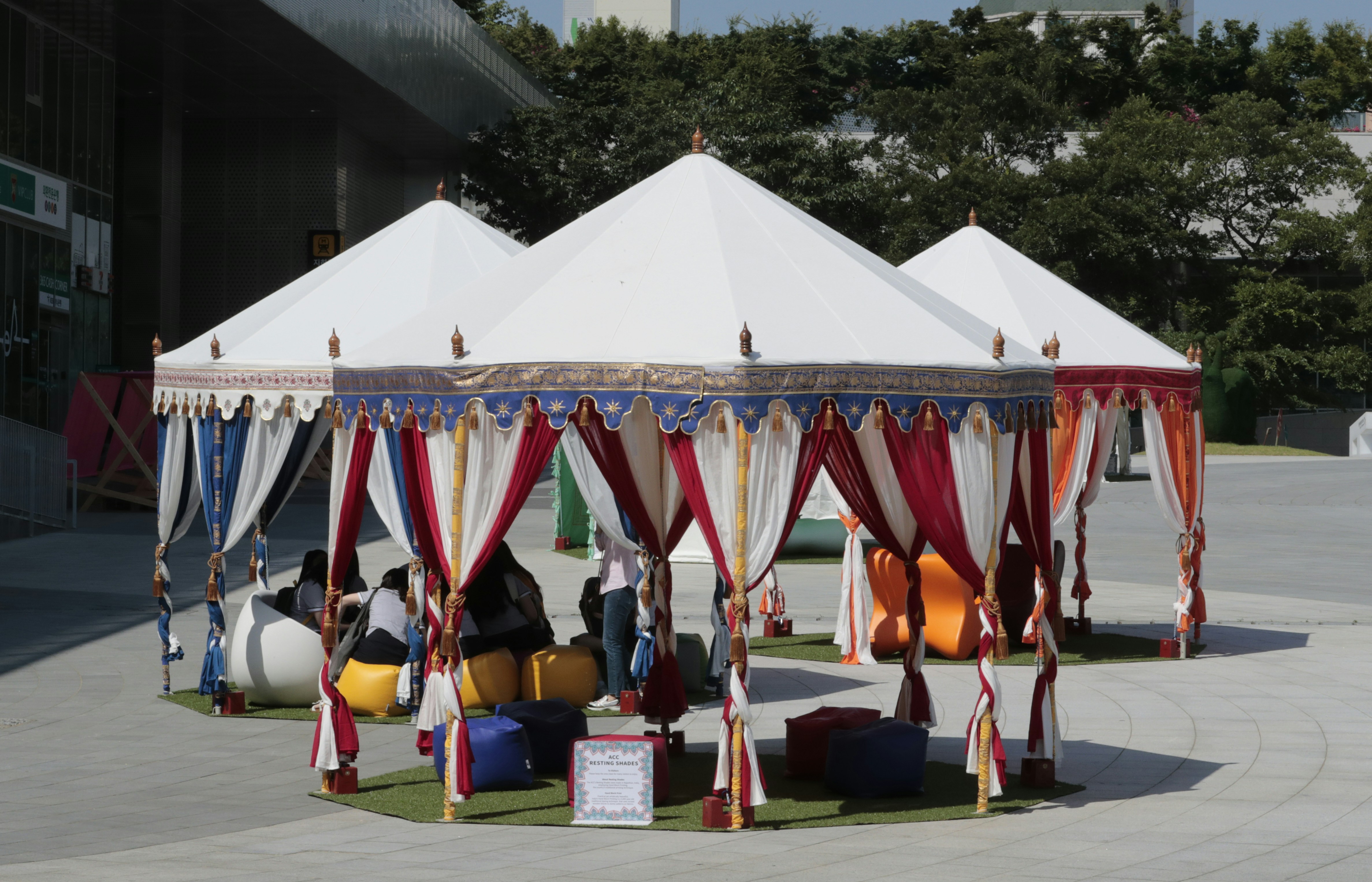 community health fair free screening outdoor tents volunteers