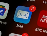 blue and white logo guessing email