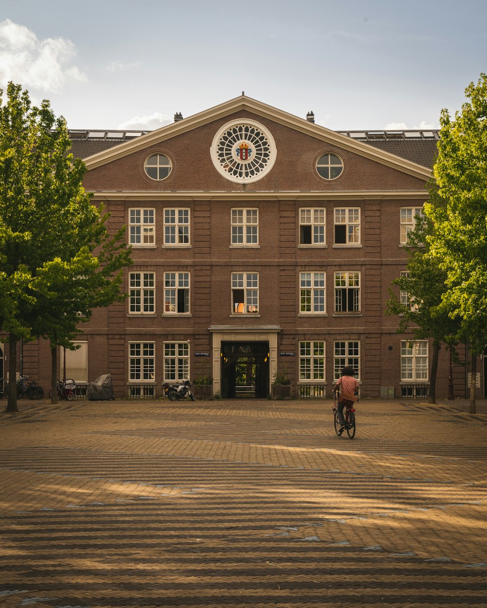 people walking on street near brown concrete building during daytime