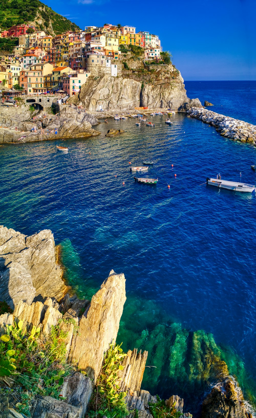 white boat on blue sea during daytime