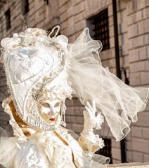 An elegant ticket design featuring the Festa Carnevale logo.