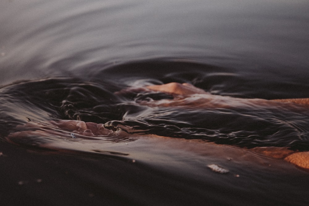 persons feet on water