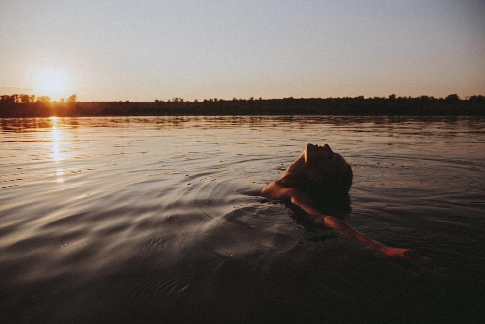 person in water during daytime