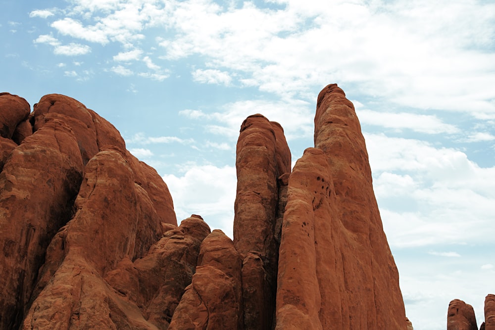 brown rock formation under blue sky during daytime