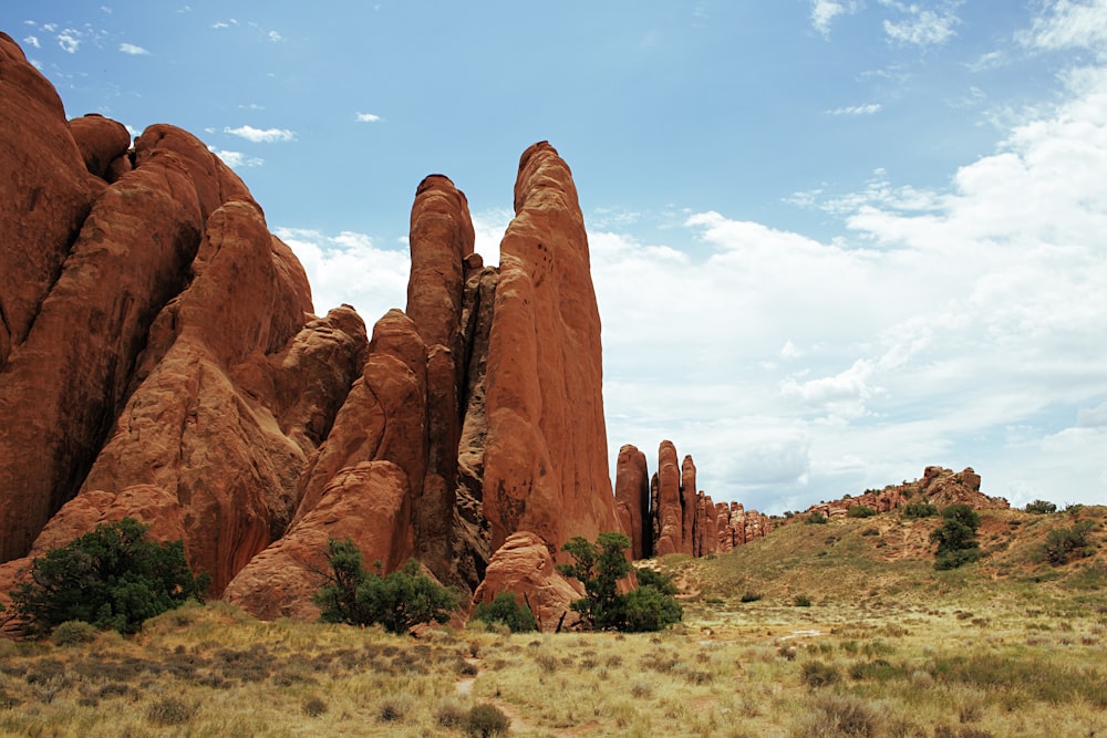 brown rock formation under blue sky during daytime