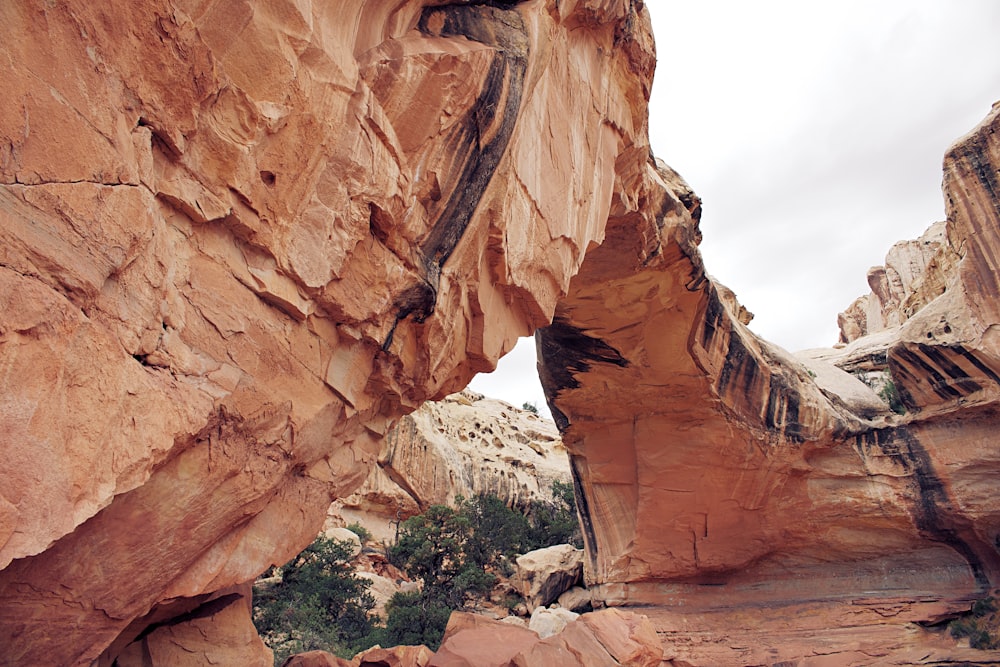 brown rock formation under blue sky during daytime