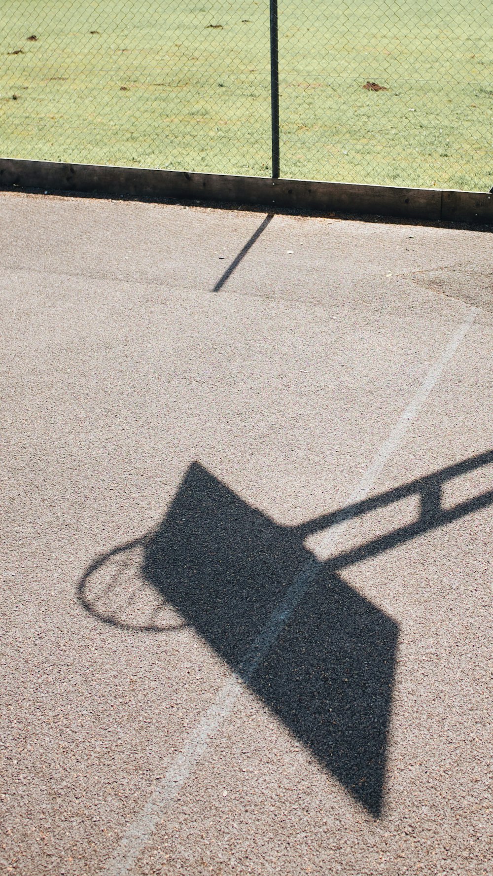 black metal stand on gray concrete road