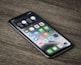 black iphone 5 on brown wooden table