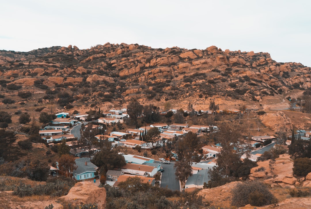 houses on brown mountain during daytime