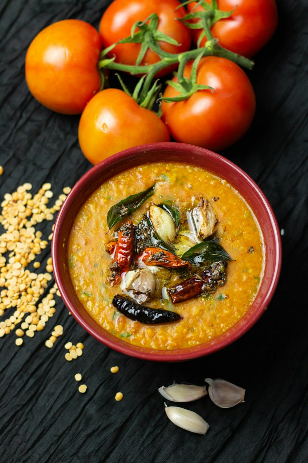 orange round bowl with rice and vegetables