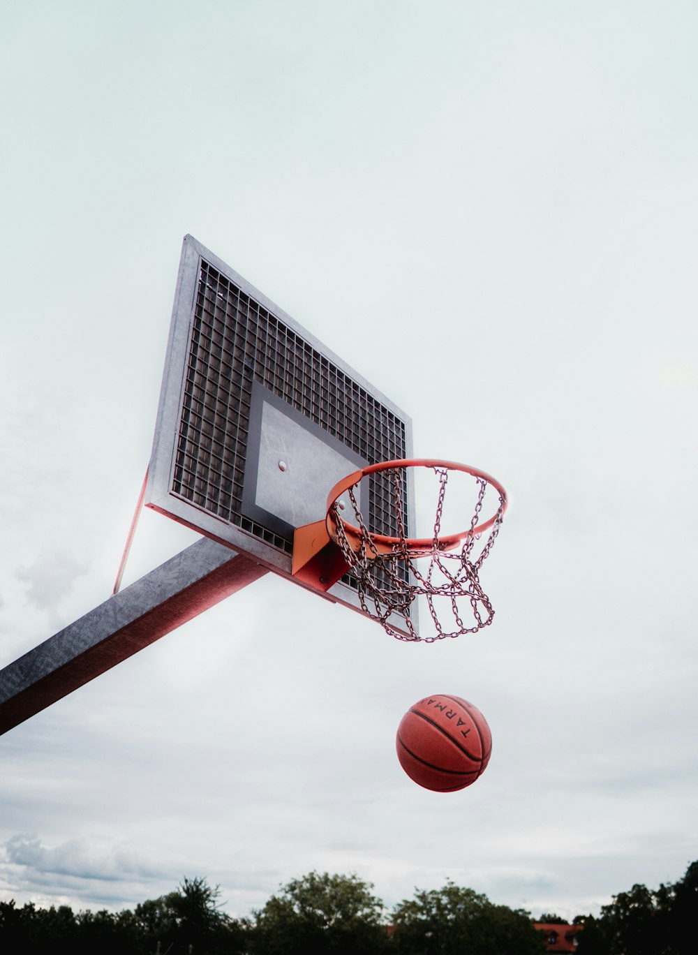 basketball hoop under white sky