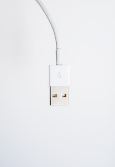 white usb cable on white surface