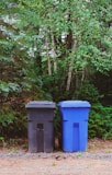 green and blue trash bins