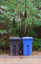 green and blue trash bins 