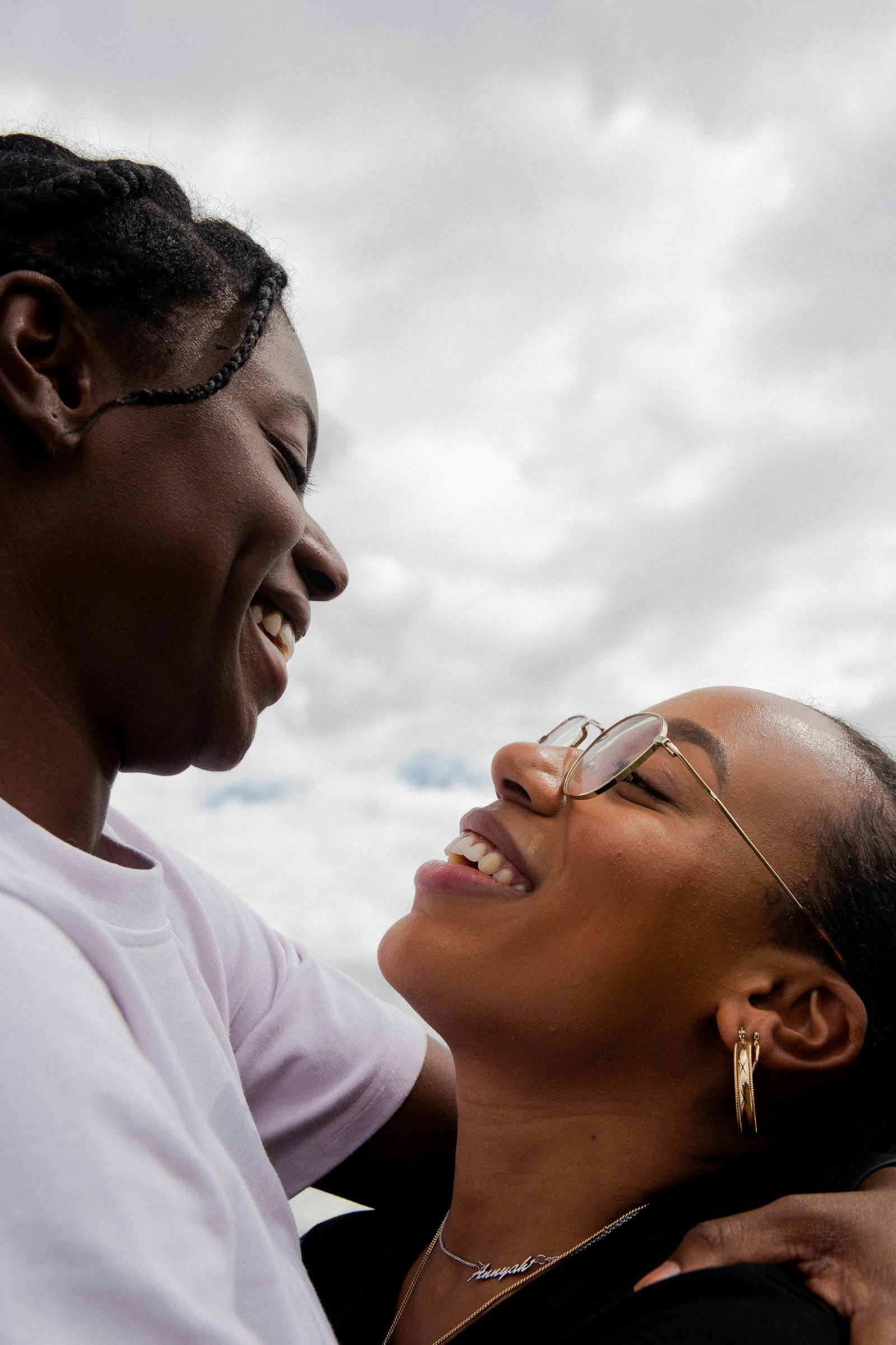 Sigma 24-70mm F2.8 EX DG Macro sample photo. Two women smiling during photography