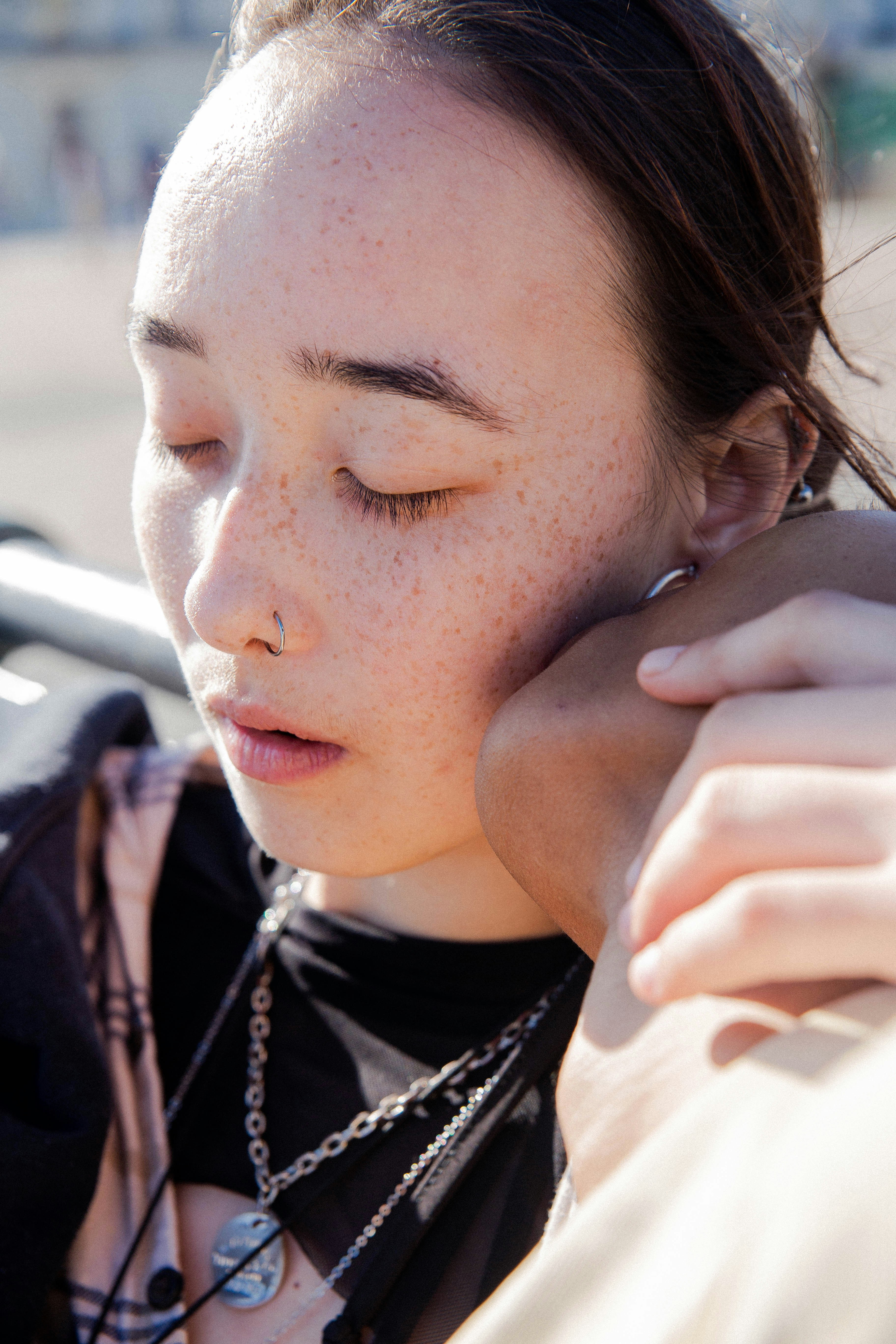 woman in black and white shirt