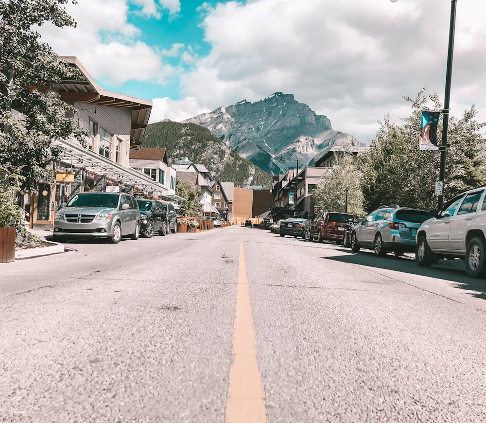 cars parked on side of the road during daytime