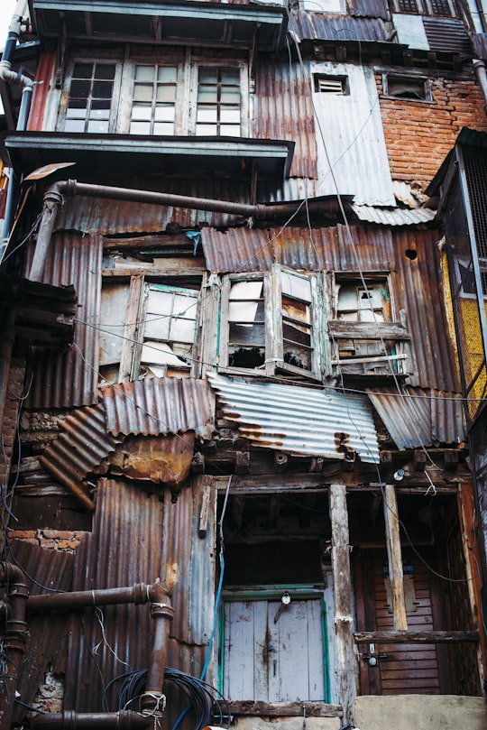 brown wooden house during daytime in Shimla India