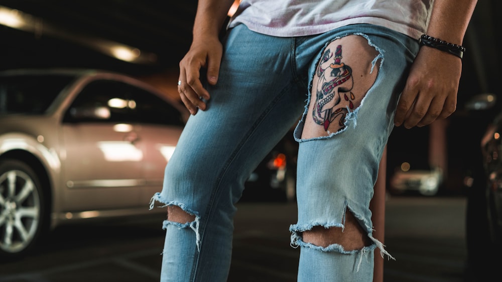 woman in blue denim jeans and pink shirt