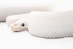 white and brown snake on white surface