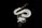 white and brown snake on black background
