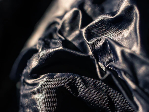 A video still of a towel unfolding smoothly with a futuristic digital effect.