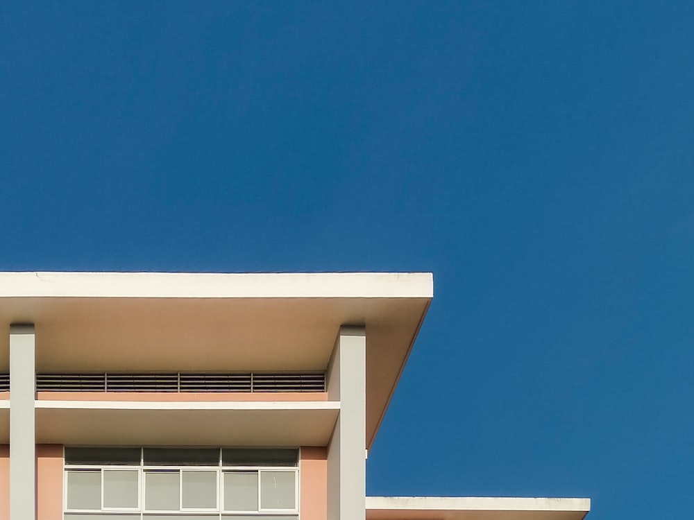 white wooden fence under blue sky during daytime