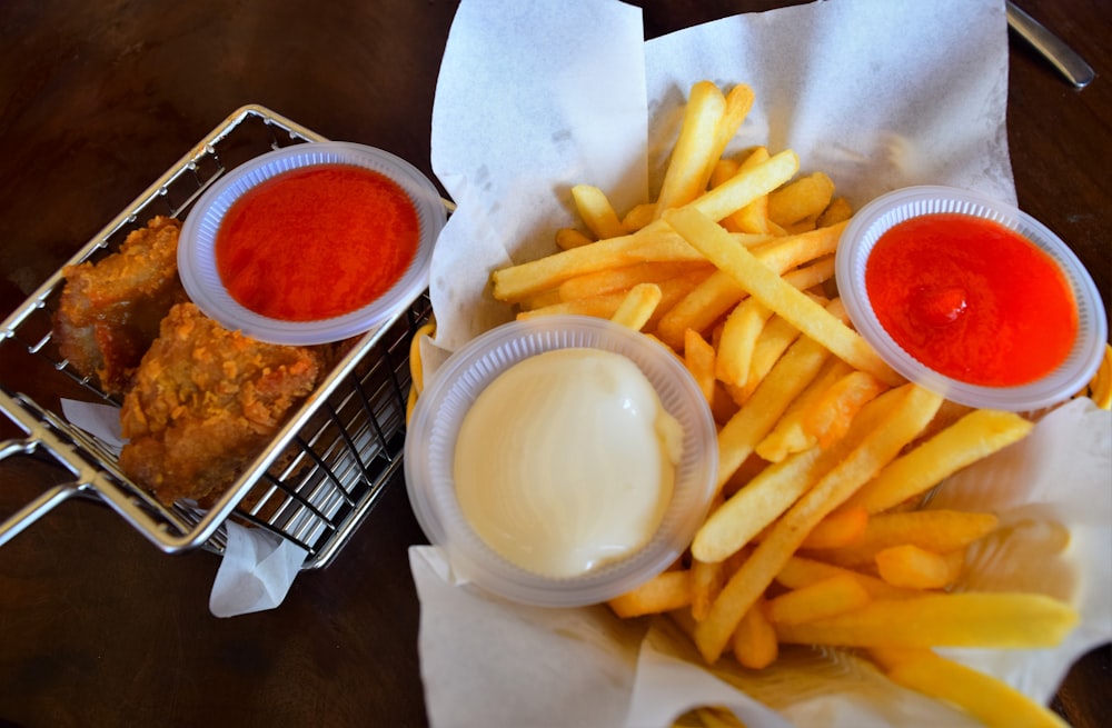 fries and sauce on white paper