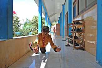 Child playing happily on a spotless floor, radiant and safe from allergens.