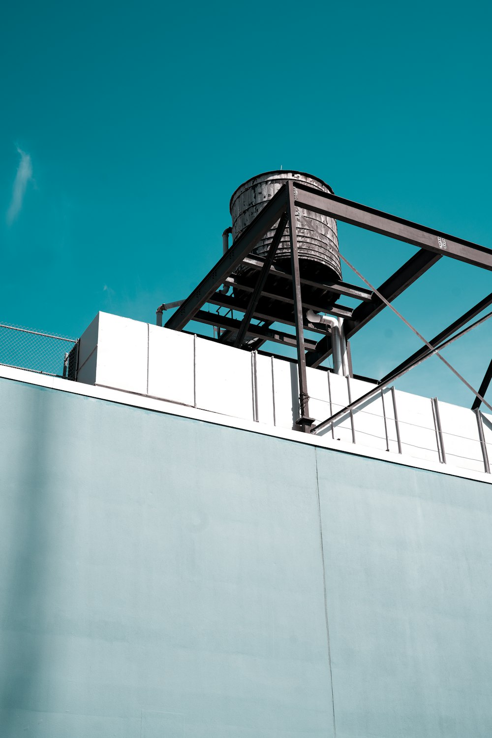 white concrete building under blue sky during daytime