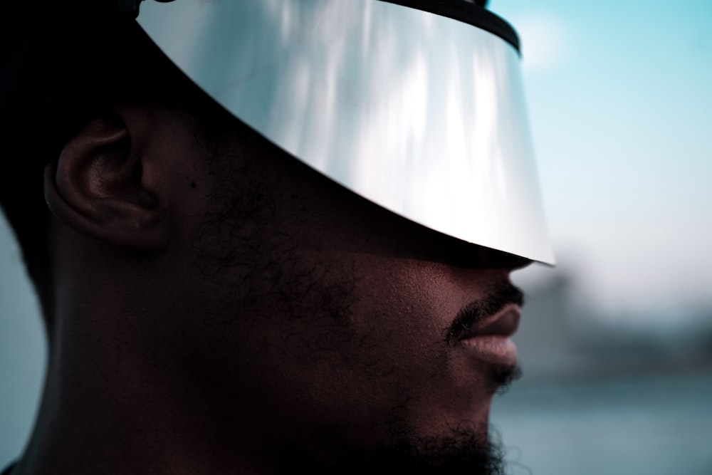 man in white and black cap