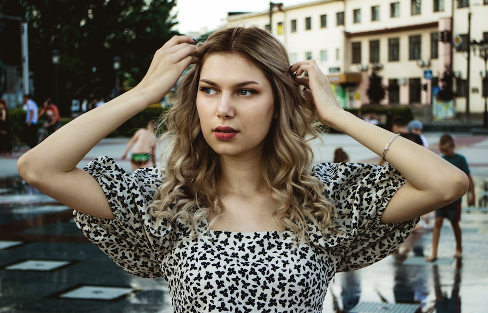 woman in black and white leopard print off shoulder shirt