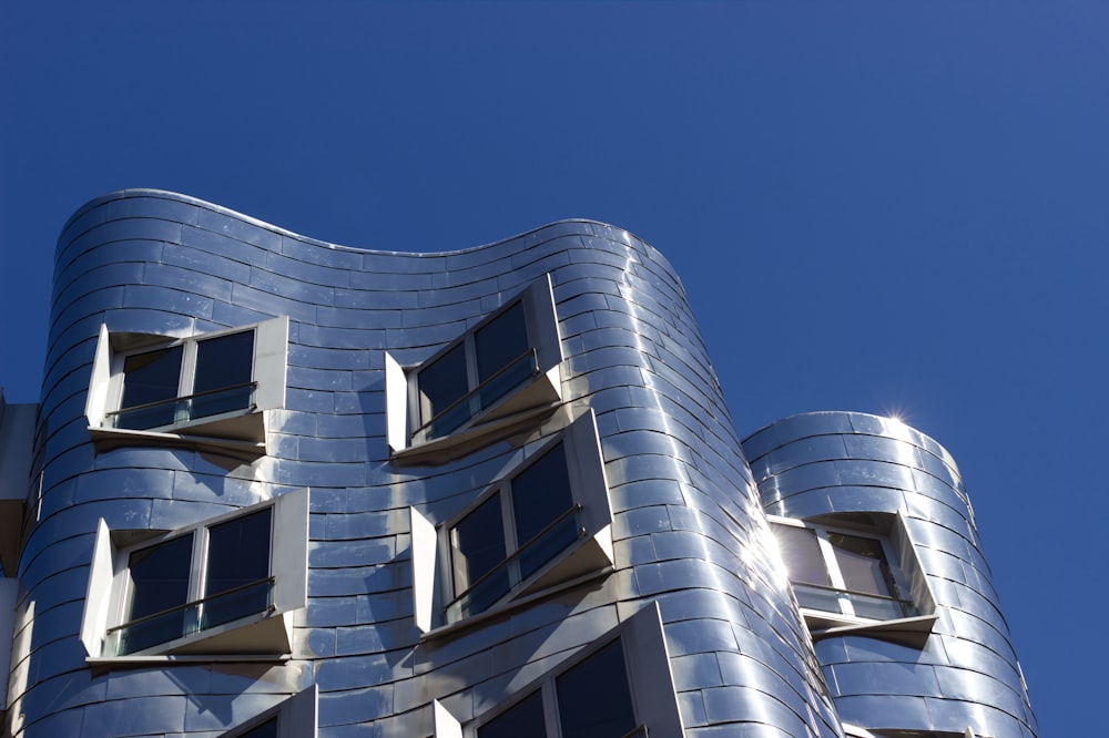 white concrete building under blue sky during daytime