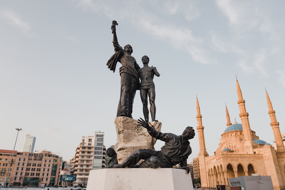 man in black suit statue