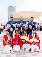 group of people wearing blue and red uniform