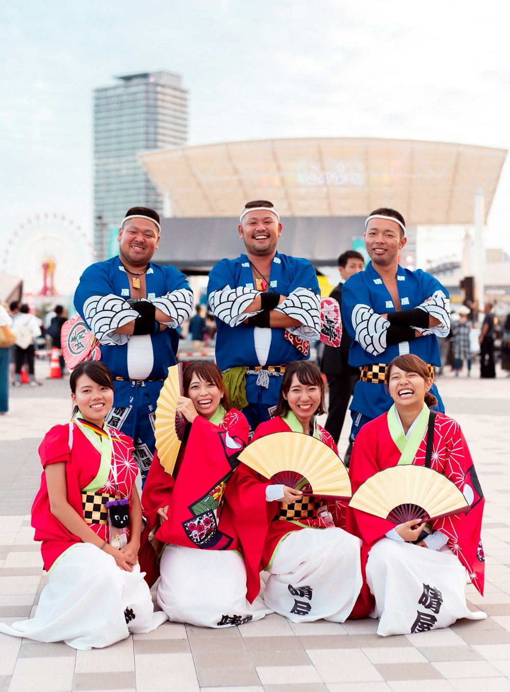 group of people wearing blue and red uniform