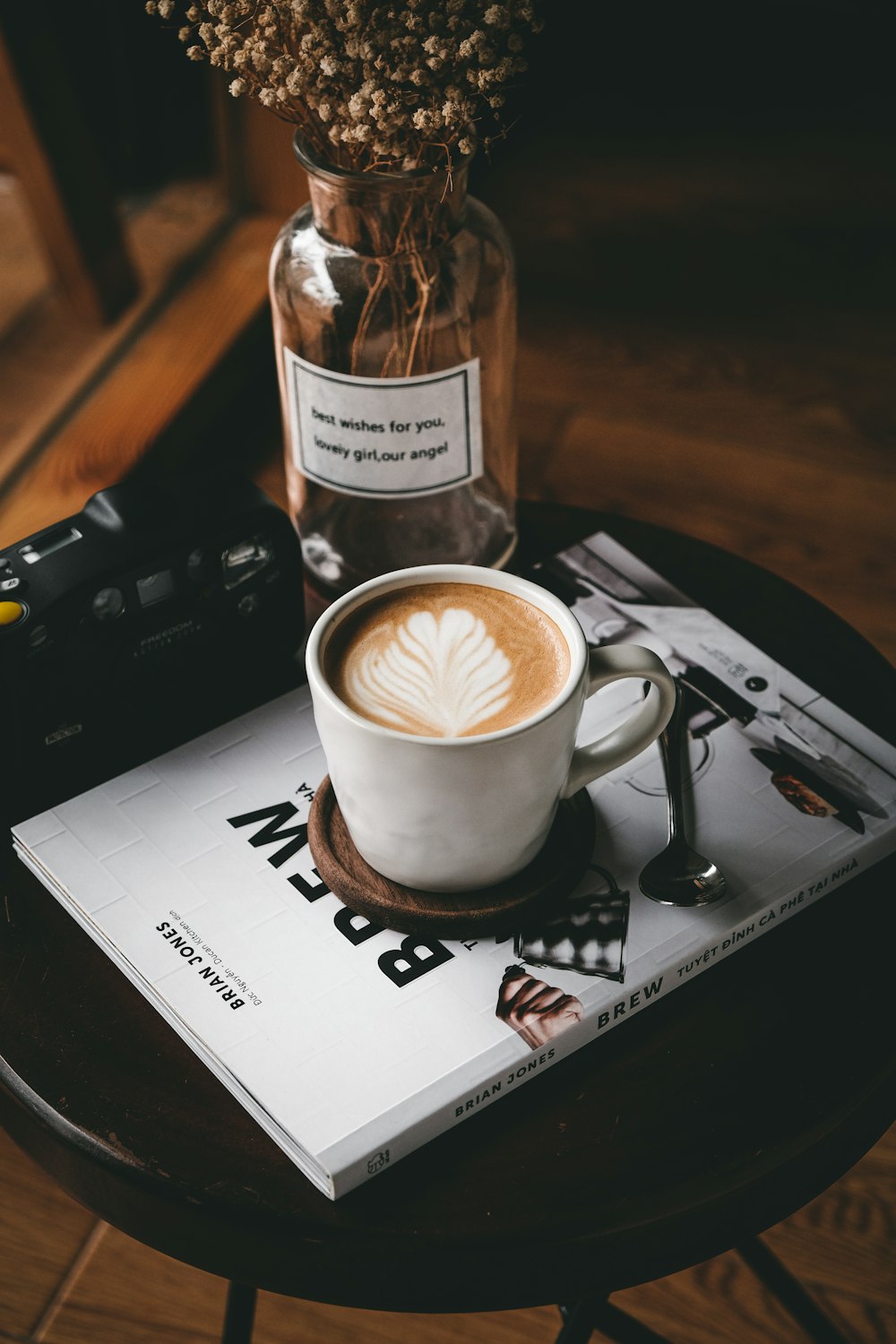 white ceramic mug on white paper