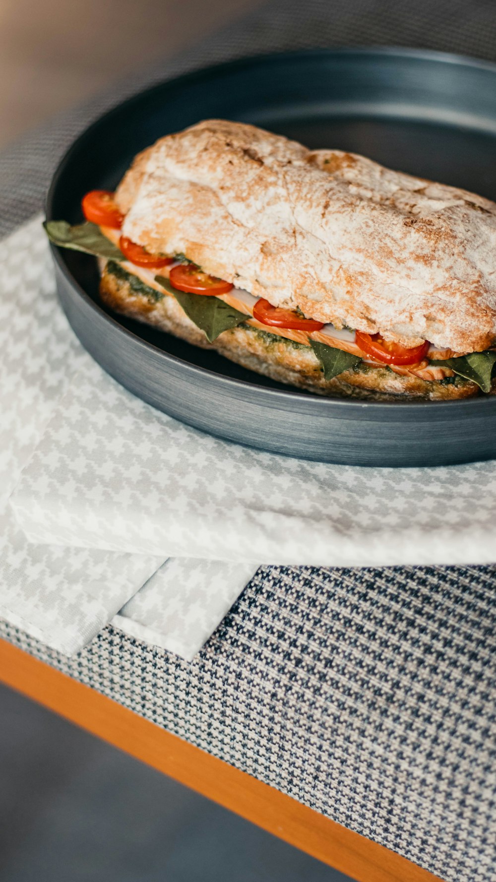 burger on black ceramic bowl