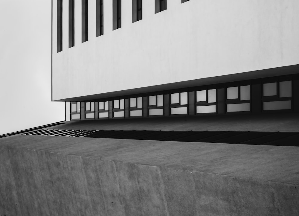 grayscale photo of concrete staircase