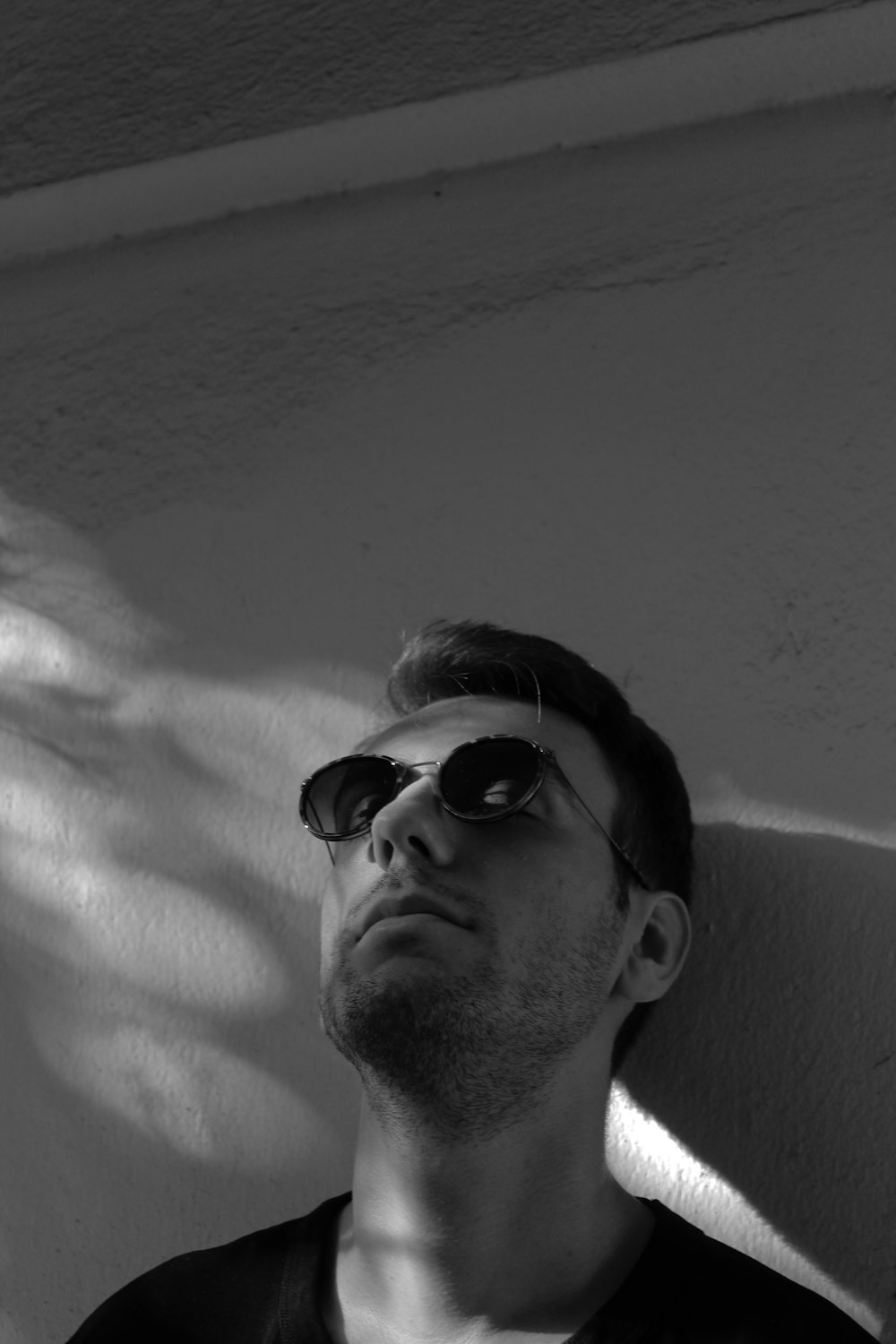 man in black sunglasses taking selfie