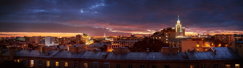 city with high rise buildings during night time