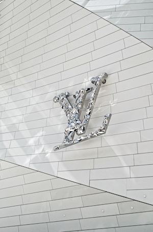 silver and gold steel wall decor