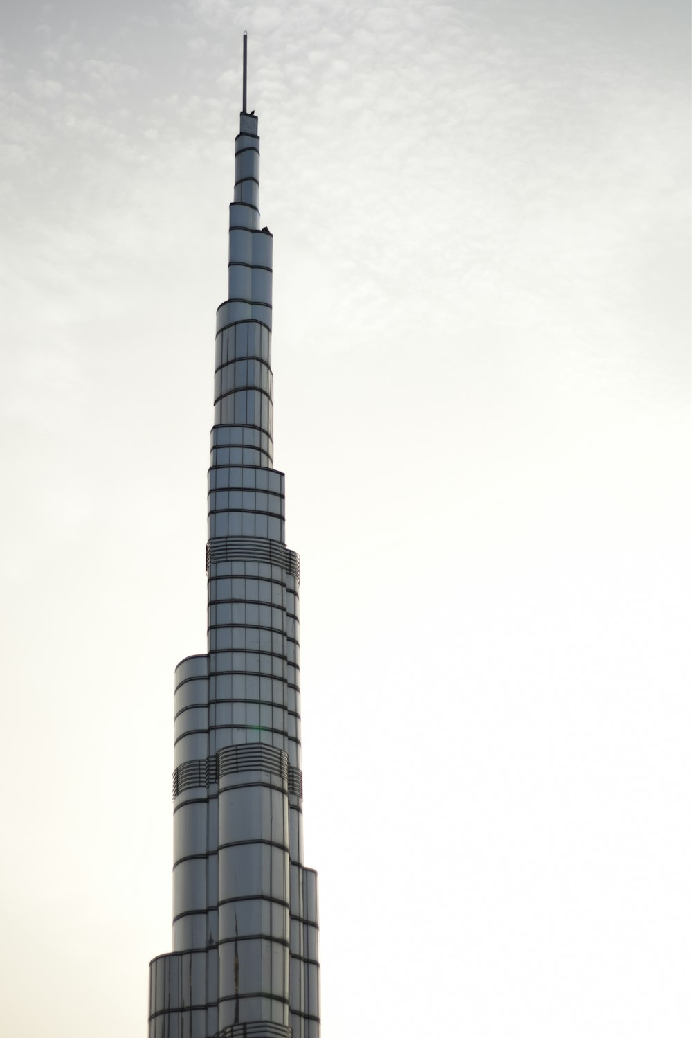 gray concrete building under white sky during daytime