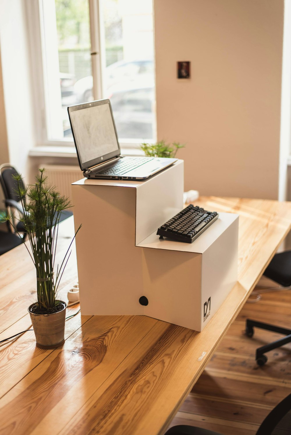 macbook pro on white wooden table